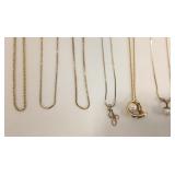 7 - 14K necklaces approx. 18" with 3 pendants -