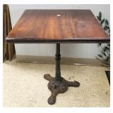Cafe table with fancy iron base 24" sq. x 27" tall