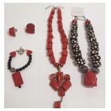 Group of designer jewelry including coral,