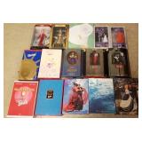 15 Barbie dolls with boxes