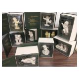 9 Snowbabies in boxes and Barbie travel case