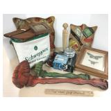 Group including wall decor, Schweppes bag,