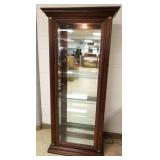 Illuminate curio cabinet with beveled glass door -