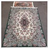 2 machine made rugs - 2