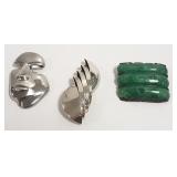 3 sterling brooches - one set w/ carved green