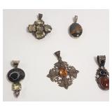 5 silver pendants set w/ stones including amber,