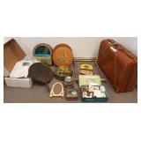 Group including iron griddle, tins, buttons,