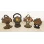 4 antique cast iron doorstop flowers-