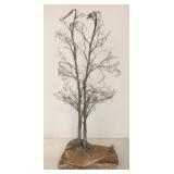 Signed metal tree on stone base 25" tall
