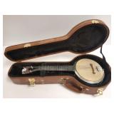 Dixie small banjo with case 20 1/2" length; 8" dia