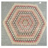 Handmade hexagonal rug with silver dollar pattern-