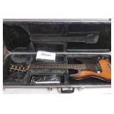 Silvertone electric bass guitar with case; model #