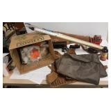 Group of gun cleaning items, accessories, leather