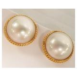 Pair of mabe pearl earrings set in 14K gold -