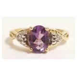 10K gold ring set with oval amethyst & side