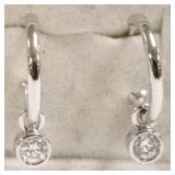10K white gold earrings set with 1/4 total ct.