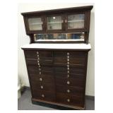 Antique mahogany 22 drawer dental cabinet with