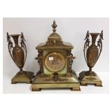Antique bronze case clock with matching garniture