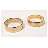 One 18K band - 2.8 grams & one 10K band - 3.0