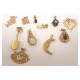 Group of 14k gold pendants - some set with stones