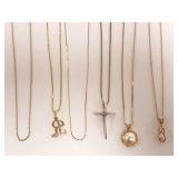 6 - 14K gold chains - 4 with pendants - 9.8 grams