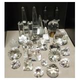 Group of cut crystal paperweights, obelisks, etc.