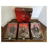 4 Barbie dolls w/ boxes - Harley Davidson &