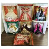 7 Barbie dolls w/ boxes - Happy Holidays