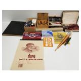 Group of carving tools, gold leaf, art supplies,