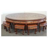 Carved warrior design glass top oval table & 8