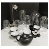 Group black pottery, stainless lamp & glass domes