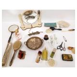 Group of dresser items including mirror, tray,