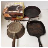 Group of cast iron pans including Wagner waffle