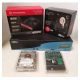 Group computer hard drives, power supplies, etc.