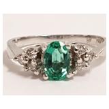 14K white gold ring set with 4 x 6 mm oval cut