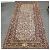 Handmade signed oriental rug approx. 64" x 140"