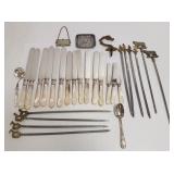 Group of mother of pearl knives, figural skewers,