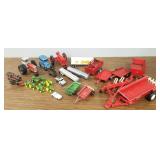 Assortment vintage toy tractors, implements,