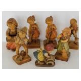 7 carved wooden Swiss children figures - 7 1/2"