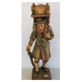 20" tall carved wooden Swiss clock peddler figure
