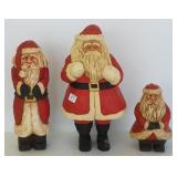 3 signed carved wood Santa figures - 14" tallest