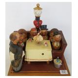 Swiss carved figural bar set with musical table -
