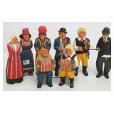 8 signed wood carvings including Charlie Chaplan,