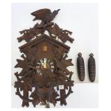 German carved cuckoo clock with bird motif 15"