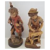 2 Peter Stahli carved figures including cabinet