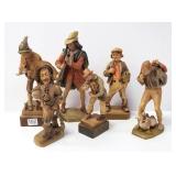6 carved wood figures including Anri, musicians,