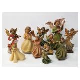10 carved wood angel figures including Stahli -