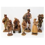 7 wood carved character figures including Detert -