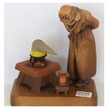 Anri carved wood figurine - man w/ fire -