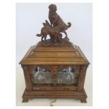 Antique carved Black Forest tantalus dog motif